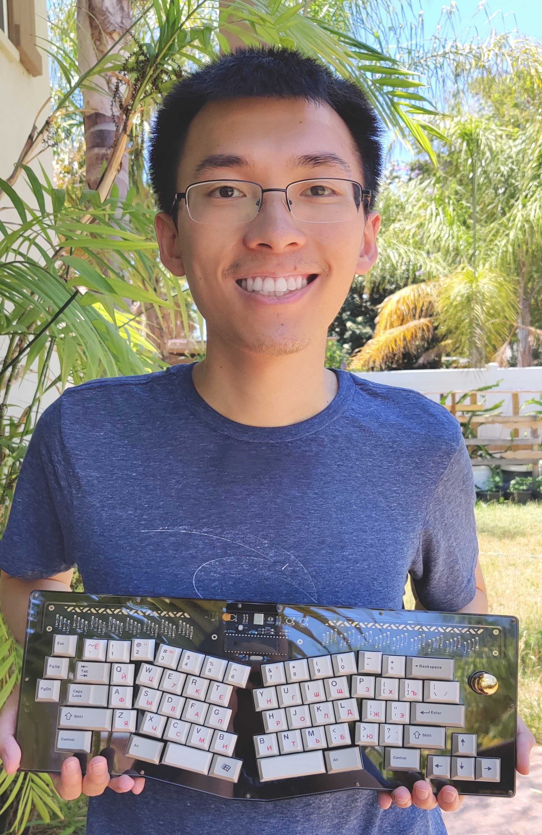 A picture of Jason Lee with one of his keyboards